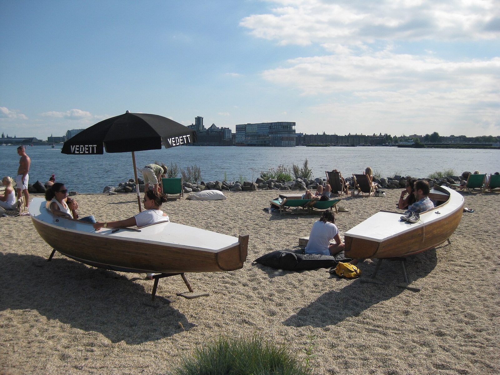 Pllek's city beach on the IJ at NDSM, a dinner spot for groups of friends in Amsterdam